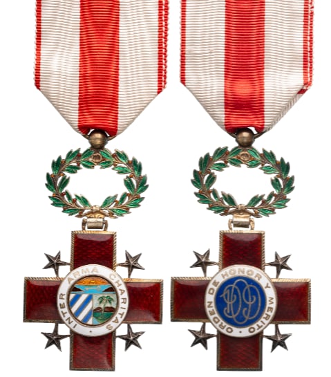 Order Of Honor & Merit Of The National Red Cross: Knight's Cross, 5th Class, instituted in 1909. Breast Badge, 70x40 mm., Silver, enameled, central medallion gilt, enameled, original gilt suspension wreath, ring and ribbon. Extremely fine condition a