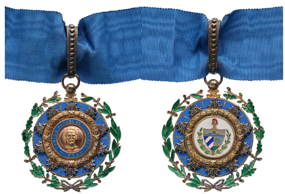 Order of Carlos Manuel de CÃ©spedes: Commander's Cross, instituted in 1926. Neck Badge, 55x49 mm., gilt Silver, both sides enameled, original suspension ring, loop and and ribbon. A superb badge, of high quality, in extremely fine condit