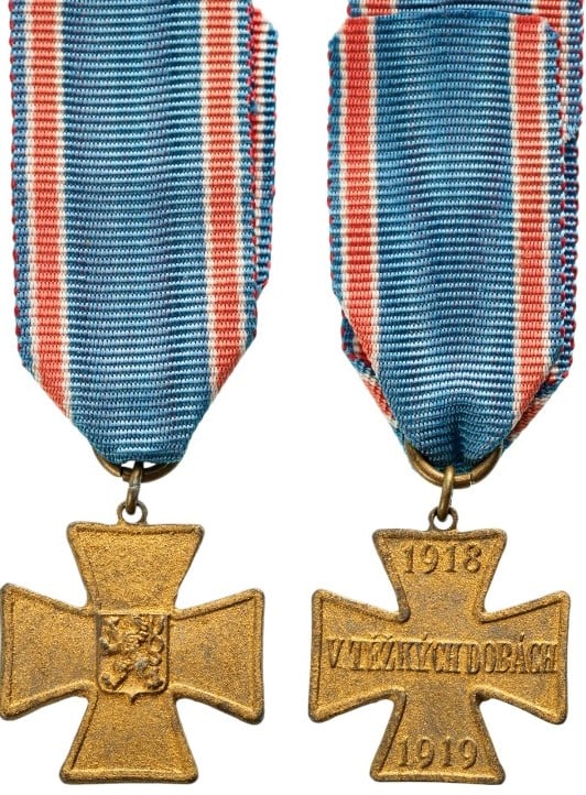 WW I Volunteer Combattants 1914-1918 Cross Miniature, instituted in 1920: Breast Badge, 16 mm., gilt Bronze, original suspension ring and ribbon. A scarce miniature, in mint condition! I R!