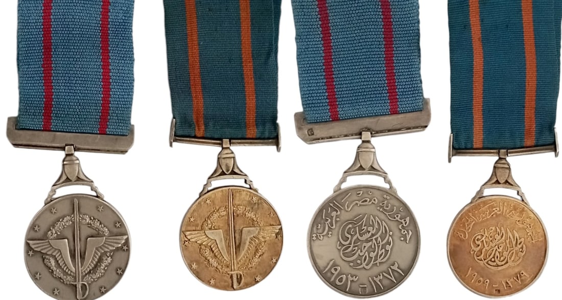 The Militar Duty Medal Set, instituted in 1953: 1st and 2nd Class. Breast Badges, 50x35 mm, gilt Siiver and Silver, original suspension rings and ribbons. Extremely fine and scarce! I (2)