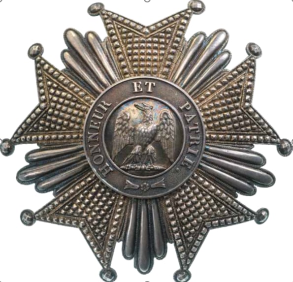 ORDER OF THE LEGION OF HONOR: Grand Cross breast star in the so-called â??Prince-Sizeâ??, 77 mm., Silver, with chiseled arms, flanked by bundles of polished beams; centre medallion with separately- mounted Imperial eagle facing 