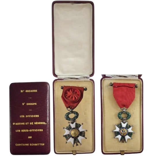 ORDER OF THE LEGION OF HONOR: Officer`s Cross, 3rd Republic, 5th Class. Breast Badge, 60x40 mm., Silver, both sides enameled, original suspension ring and ribbon, in luxury case of issue, with gilt dedication on the lid to A Capta