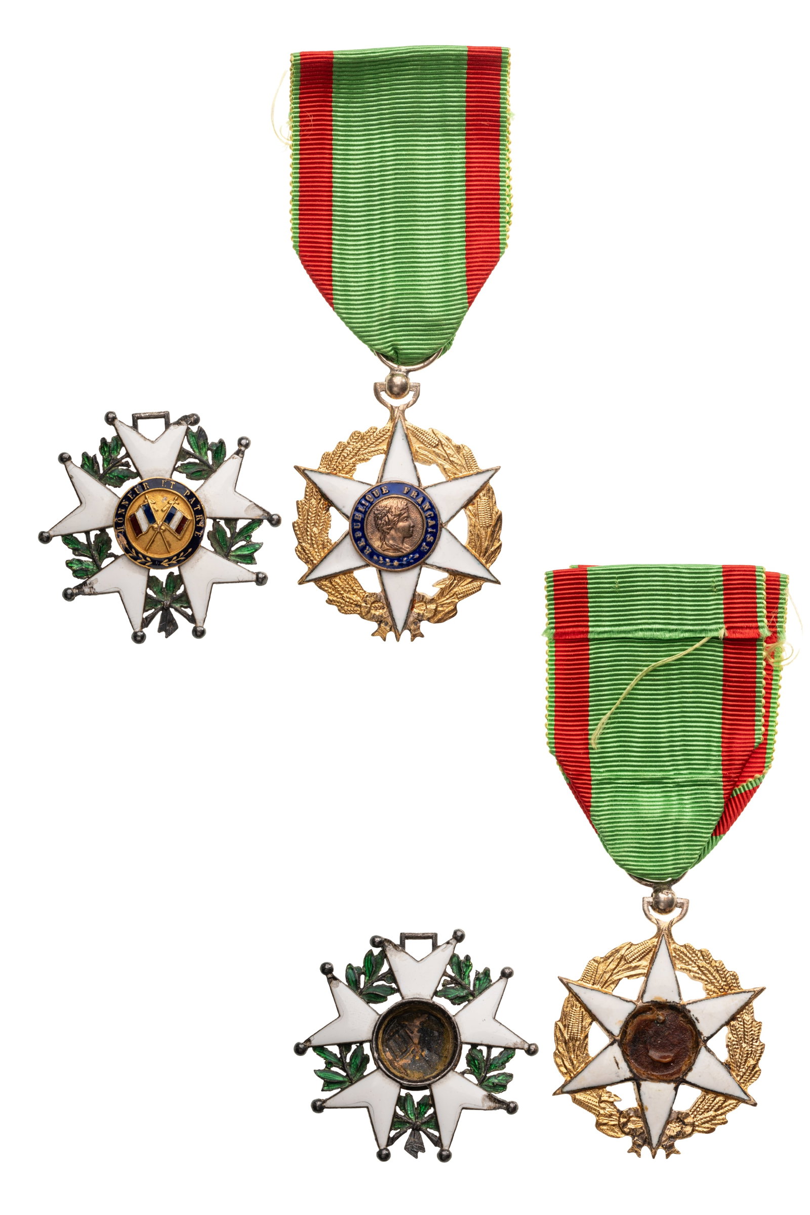 Lot of 2. Order of the Legion of Honor and Agricultural Merit Order: Lot of 2. Knight's Crosses, 3rd Republic. Breast Badges, 58x41 mm. and 46x40 mm., Silver and one GOLD center, obverse of the Legion of Honor and reverse of the Agricultural Merit Order centers missing