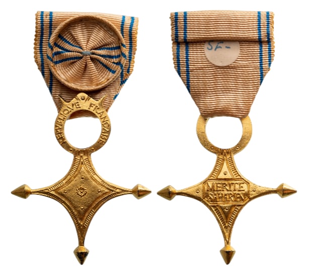 SAHARIAN MERIT ORDER: Officer`s Cross, 5th Republic, 2nd Class, instituted in 1958. Breast Badge, 92x51 mm., gilt Silver, original suspension bar and ribbon with rosette. Extremely fine condition and rare! I R!