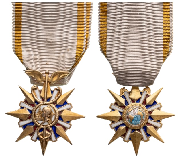 Commercial and Industrial Merit Order: Knight`s Cross, 5th Class, instituted in 1939. Breast Badge, 43x40 mm, Silver, enameled, original suspension bar and ribbon. Extremely fine condition and scarce! I R!