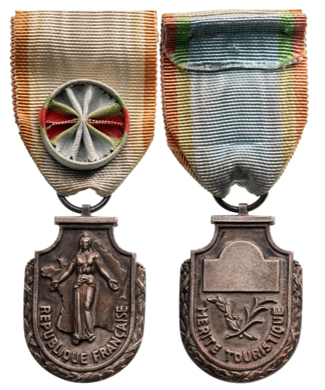 TOURISTIC MERIT ORDER: Officer`s Cross, 4th Republic, 2nd Class, instituted in 1949. Breast Badge, 51x36 mm., Silver, original suspension ring and ribbon with rosette. Extremely fine condition! I