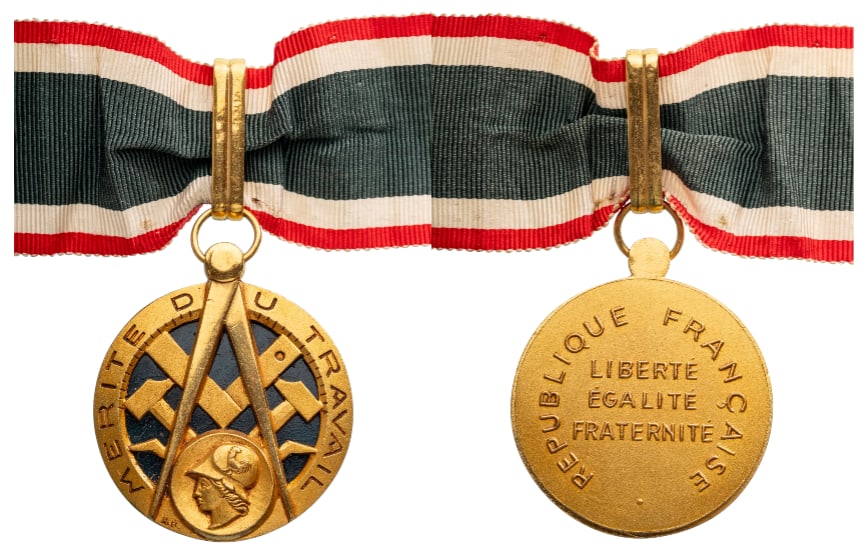 LABOUR MERIT ORDER: Commander`s Cross, 4th Republic, 1st Class, instituted in 1957. Neck Badge, 46x40 mm., gilt Bronze, original suspension ring and ribbon. Scarce and extremely fine condition! I