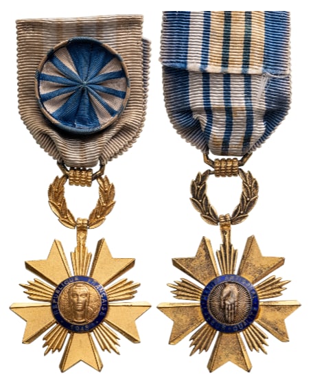 Artisanal Merit Order: Officer`s Cross, 4th Republic, 3rd Class, instituted in 1948. Breast Badge, 60x39 mm, gilt Silver, enameled, original suspension wreath, ring and partially discolored ribbon with rosette. Extremely