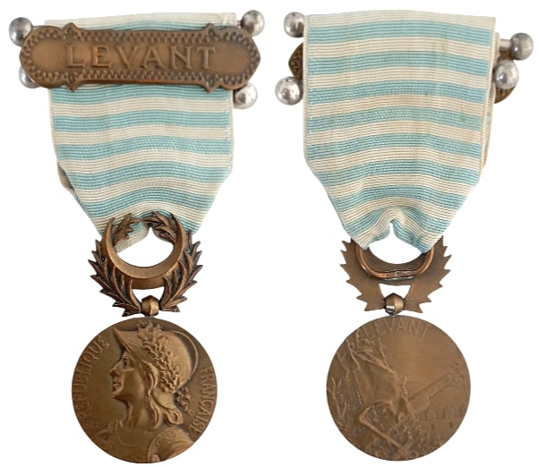 Syria-Cilicia Commemorative Medal, 1922: Breast Badge, 66x30 mm, Bronze, original suspension device and ribbon with clasp "LEVANT". Scarce and mint state! I R!