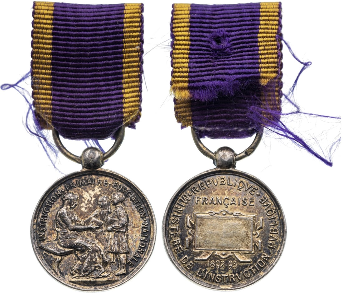 PRIMARY EDUCATION - PUBLIC EDUCATION MEDAL, 1892-1893: Breast Badge Miniature, 15x13 mm, gilt Silver, original suspension ring and ribbon. Scarce! I R!