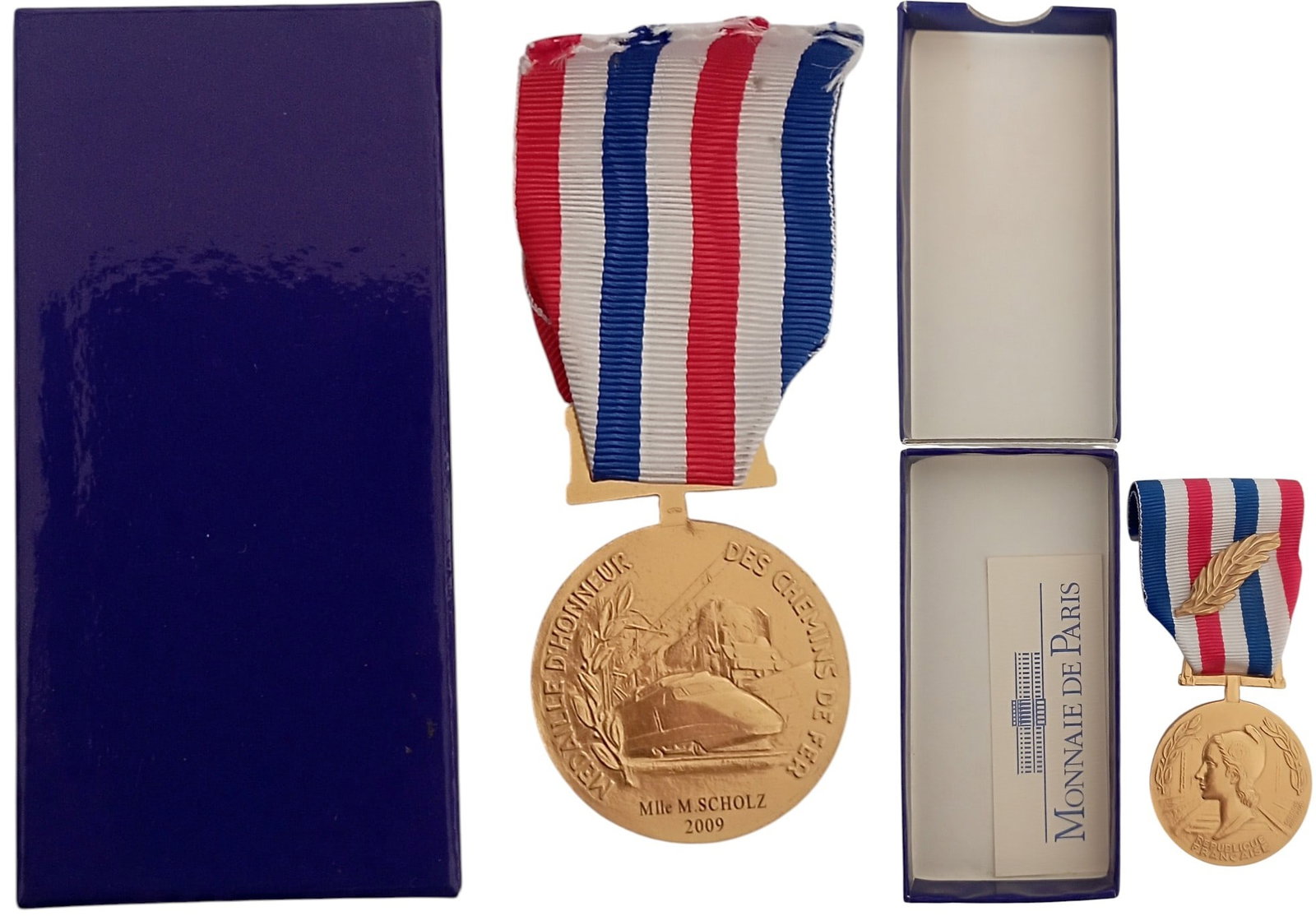Railways Honor Medal, 1955: Breast Badge, 42x32 mm, gilt Bronze, named and dated 2009, original suspension ring and ribbon with palm, in case of issue by "Monnaie de Paris". I