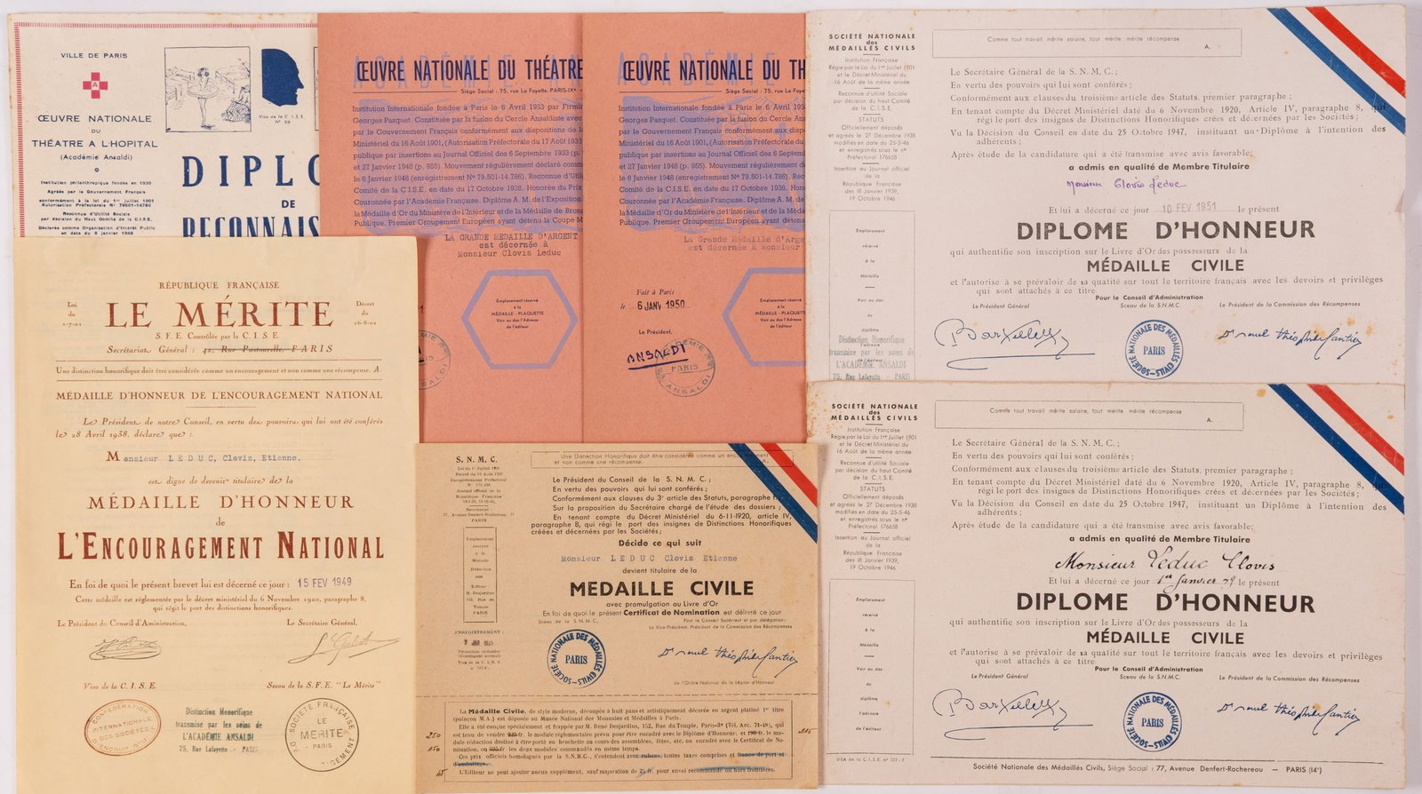 Group of Awarding Documents of a French Dandy: Merit Medal; Great Silver Merit Medal; Civil Medal (3x); Honor Medal of the Theater in the Hospital National Work Awarding documents, dated 1949 - 1951. Extremely fine condition and very interesting!