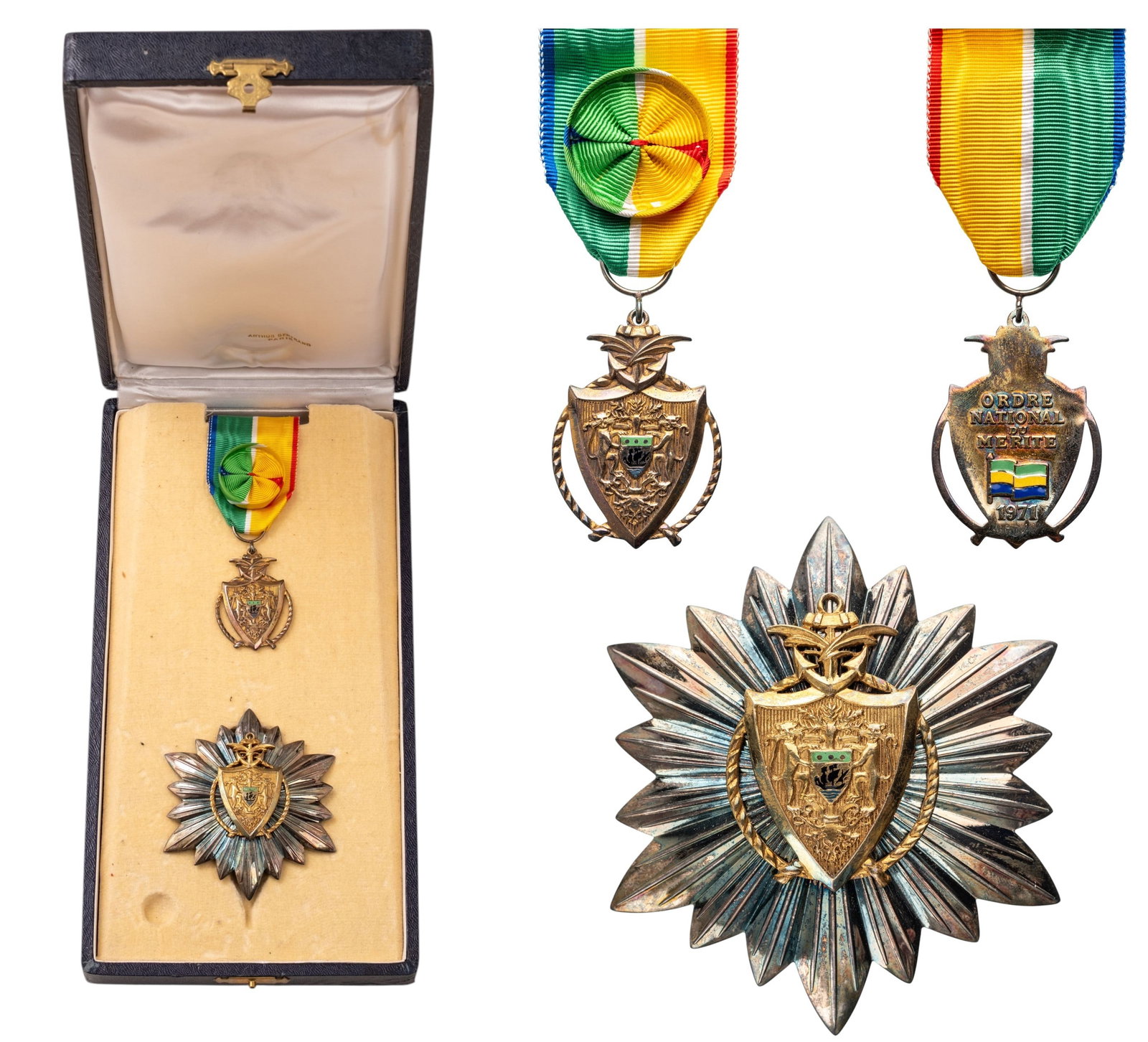NATIONAL ORDER OF MERIT: Grand Officer's Set, instituted in 1971. Neck Badge, 45x32 mm, gilt Silver, both sides enameled, original suspension ring and ribbon with rosette. Breast Star, 78 mm, Silver, original pin on reverse