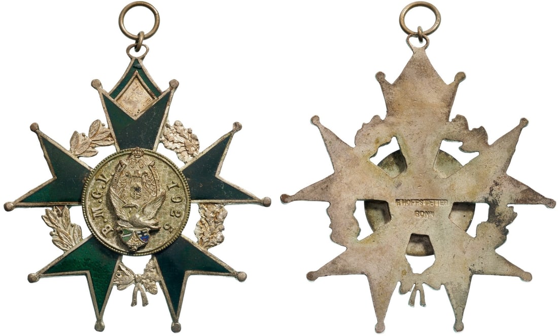 Bonn Carnival Badge, 1925: Breast Badge, 70x62 mm., gilt Silver, maker's mark "F. Hofstaetter - Bonn", enameled, original suspension ring and ribbon. Very attractive and mint state! I