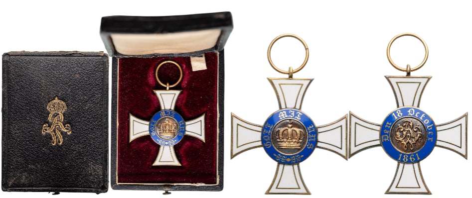 Order of the Crown: 3rd Class. Breast Badge, 47x43 mm, GOLD and Silver, 11.66 g., maker's mark "W", enameled, original suspension ring, in case of issue, with gilt monogram on the lid. Beautiful cross in mint state! I