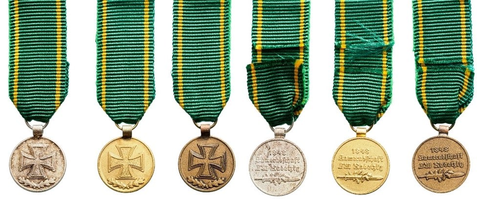 Kameradschaft FM Radetsky, 1848, Medal Set 1st, 2nd and 3rd Classes: Breast Badges, 18x14 mm, gilt and silvered and Bronze, original suspension rings and ribbons. I (3)