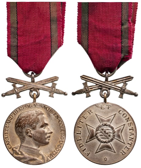 Saxe-Ernestine House Order Medals Of Merit: Type IV, Military Division, instituted in 1833. Breast Badge, 42x30 mm, Silver, original suspension ring and ribbon with crossed swords. A nice cross in extremely fine condition! I