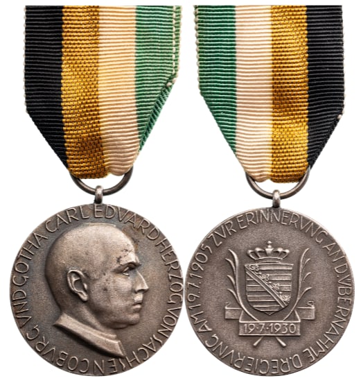 25th Anniversary of Reign Medal, 1930: Breast Badge, 39x35 mm, Silver, original suspension ring and ribbon. A beautiful medal, with superb patina, in extremely fine condition! I
