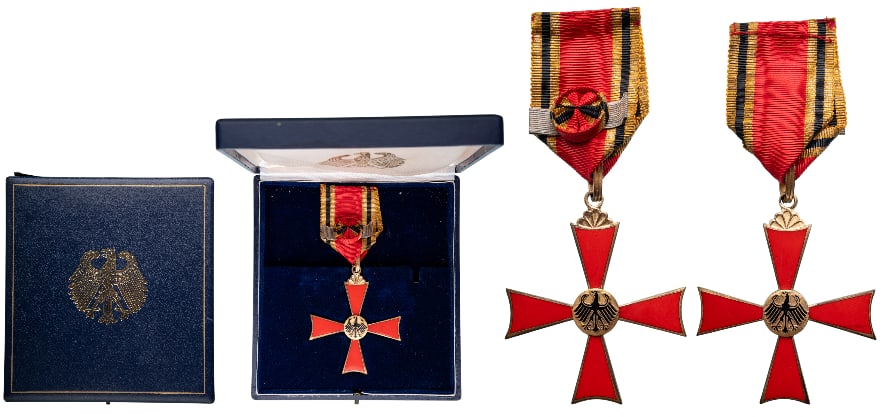 ORDER OF MERIT OF THE FEDERAL REPUBLIC: Commander`s Cross worn as Officer's Cross, instituted in 1951. Breast Badge, 3rd Class, 71x60 mm., gilt Silver, both sides enameled, original suspension ring and ribbon with rosette and silver bar, in