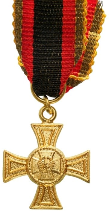 ORDER OF MERIT OF THE FEDERAL REPUBLIC: Officer's Cross, instituted in 1951. Breast Badge, 20x18 mm., gilt Metal, original suspension ring and ribbon. A beautiful miniature, in mint state! I
