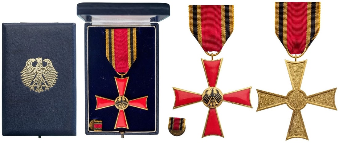 ORDER OF MERIT OF THE FEDERAL REPUBLIC: Knight's Cross, instituted in 1951. Breast Badge, 59x55 mm., gilt Bronze, both sides enameled, original suspension ring and ribbon, in case of issue with gilt weapon on the lid and lapel bar. A beauti
