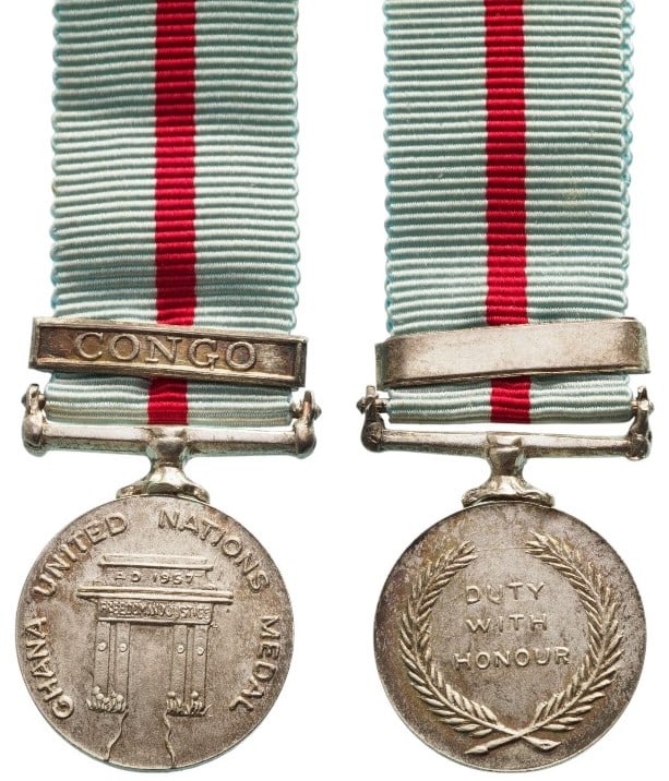 United Nations Medal: Breast Badge, 22x18 mm., Silver, original suspension ring and ribbon with "Congo" clasp. A scarce miniature in mint condition! I R!