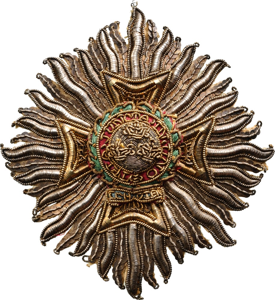 The Most Honourable Order of the Bath: An Early, embroidered Grand Cross Breast Star of the Military Division (from 1815), 110x98 mm, the rays made of rich silver broderies, paillettes and wires, small loops to the tips, the centre in gilt