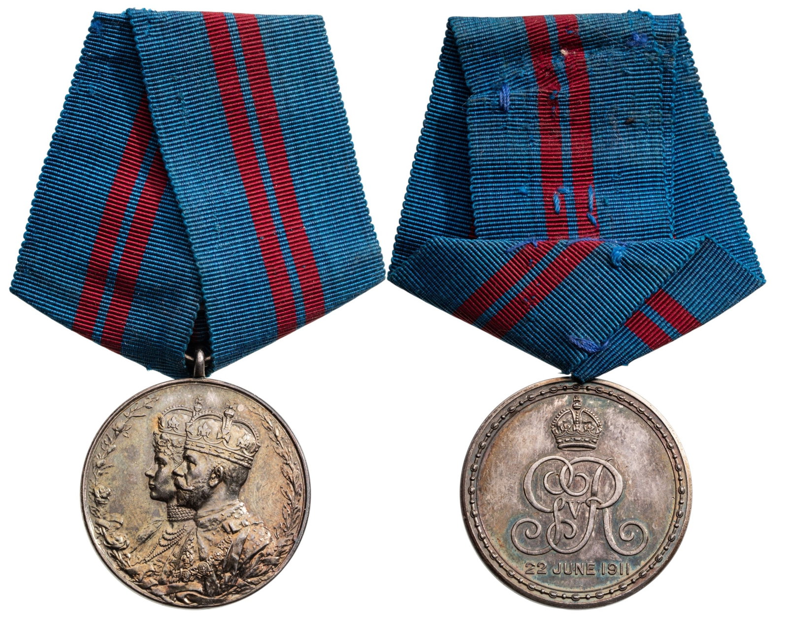 Delhi Durbar Medal, 1911: Breast Badge, 38x32 mm, Silver, original suspension ring and ribbon. A superb medal, in best condition! I