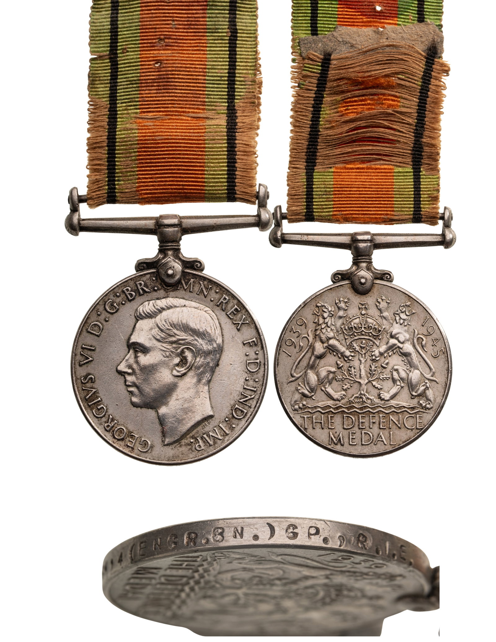 Defence Medal: Breast Badge, 45x36 mm, Cupro-Nickel, named to "C. 52395 SPR. SANTA SINGH 4 (ENGR BN) GP. R.I.E.", original suspension ring and worn ribbon. Extremely fine condition! I