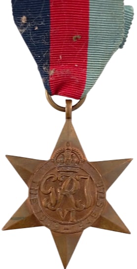 The 1939 - 1945 Star: Breast Badge, 50x43 mm, Bronze, original suspension ring and ribbon. Mint condition! I