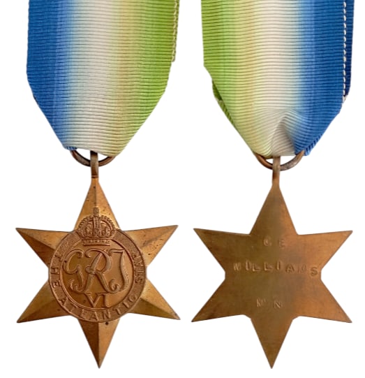 The Atlantic Star: Breast Badge, 50x43 mm, Bronze, original suspension ring and ribbon. Mint condition! I