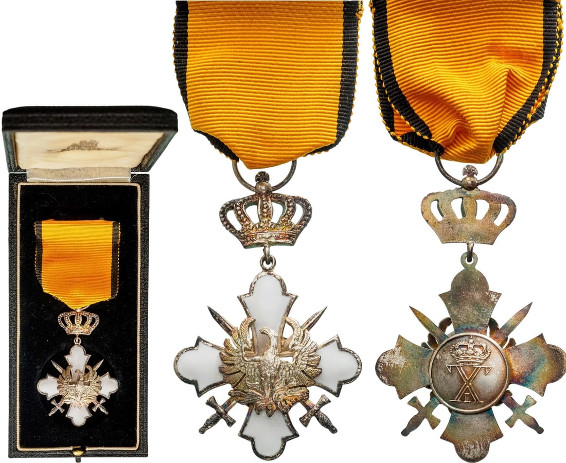 Order of the Phoenix: Knight's Cross with Swords, 2nd Type. Breast Badge 58x38 mm, Silver and white enamel, obverse centre with convex phoenix rising from the flames, crossed swords between the cross's arms, reverse medall