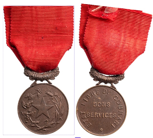 Duchy of Counani, The Counani Medal for Good Services, instituted by the "Constitutional Executive: Breast Badge, 38x35 mm,Bronze, original suspension ring and triangular ribbon. Extremely fine condition and very rare! IRR!