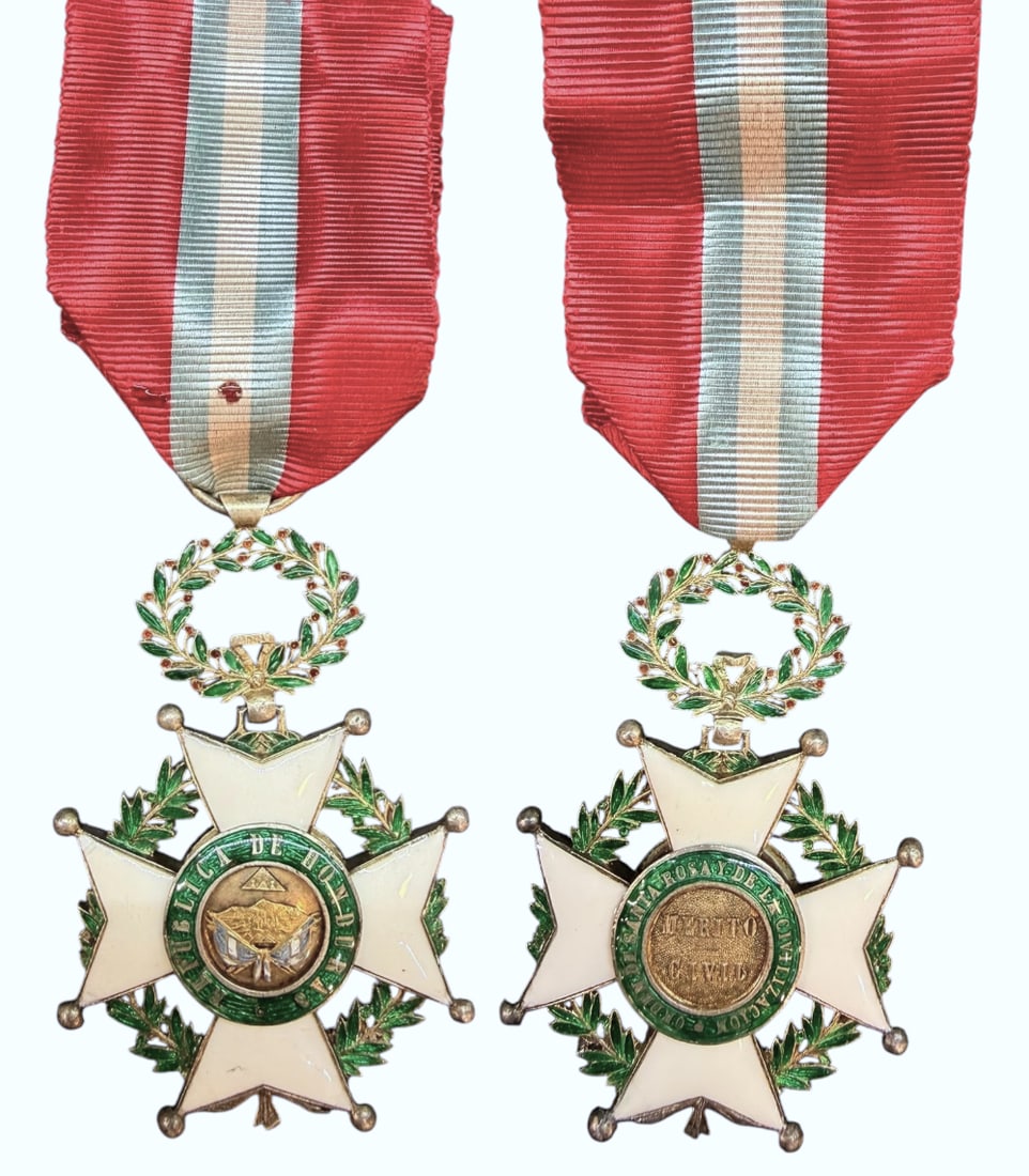 The Order of Santa Rosa and of Civilisation: Knight's Cross, 5th Class, instituta in 1868. Breast Badge 61x40 mm, gilt Silver, white and green enameled, superimposed parts construction, laurel wreath suspension, circular ring and original ribbon