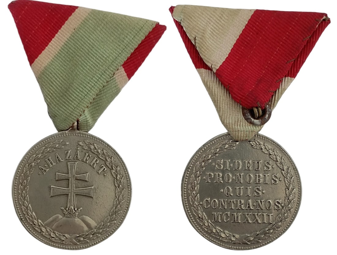 Medal of Merit: Civil Division, instituted in 1923. Breast Badge, 43x38 mm, Silver, reverse inscription with dates "1922", original suspension ring and triangular ribbon. Scarce and attractive medal, in mint conditio