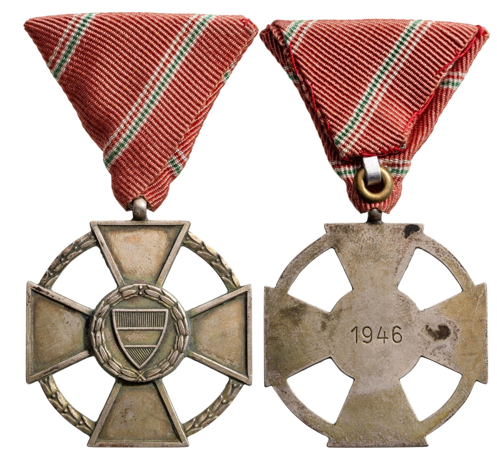 Medal of Merit, 1946: Breast Badge, 48x43 mm, Silver, reverse inscription with dates "1946", original suspension ring and triangular ribbon. Scarce and attractive medal, in very fine condition! II R!