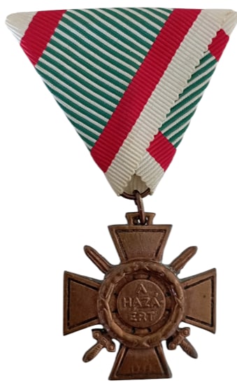 Fire Cross, 1942: 1st Class, instituted in 1941. Breast Badge, 40x37 mm, Bronze, original suspension ring and triangular ribbon. Extremely fine! I