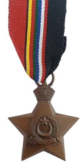 Bahawalpur Victory Star, 1939-1945: Breast Badge, 48x42 mm, Bronze, original suspension ring and ribbon. Extremely fine condition. I