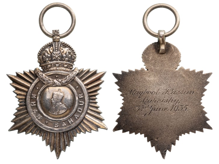 Khan Badur Title Badge, 1935: Breast Badge, 58x52 mm, Silver, 45 g., named and dated on reverse, original suspension ring. Extremely fine condition! I