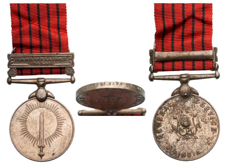 General Service Medal, 1947: Breast Badge, 47x36 mm., Cupro-Nickel, numbereed "1016589" and named "Dhani RamC.I. Horse", original ring and ribbon with bar "Jammu and Kashmir, 1947-1948". Extremely fine and interesting! I