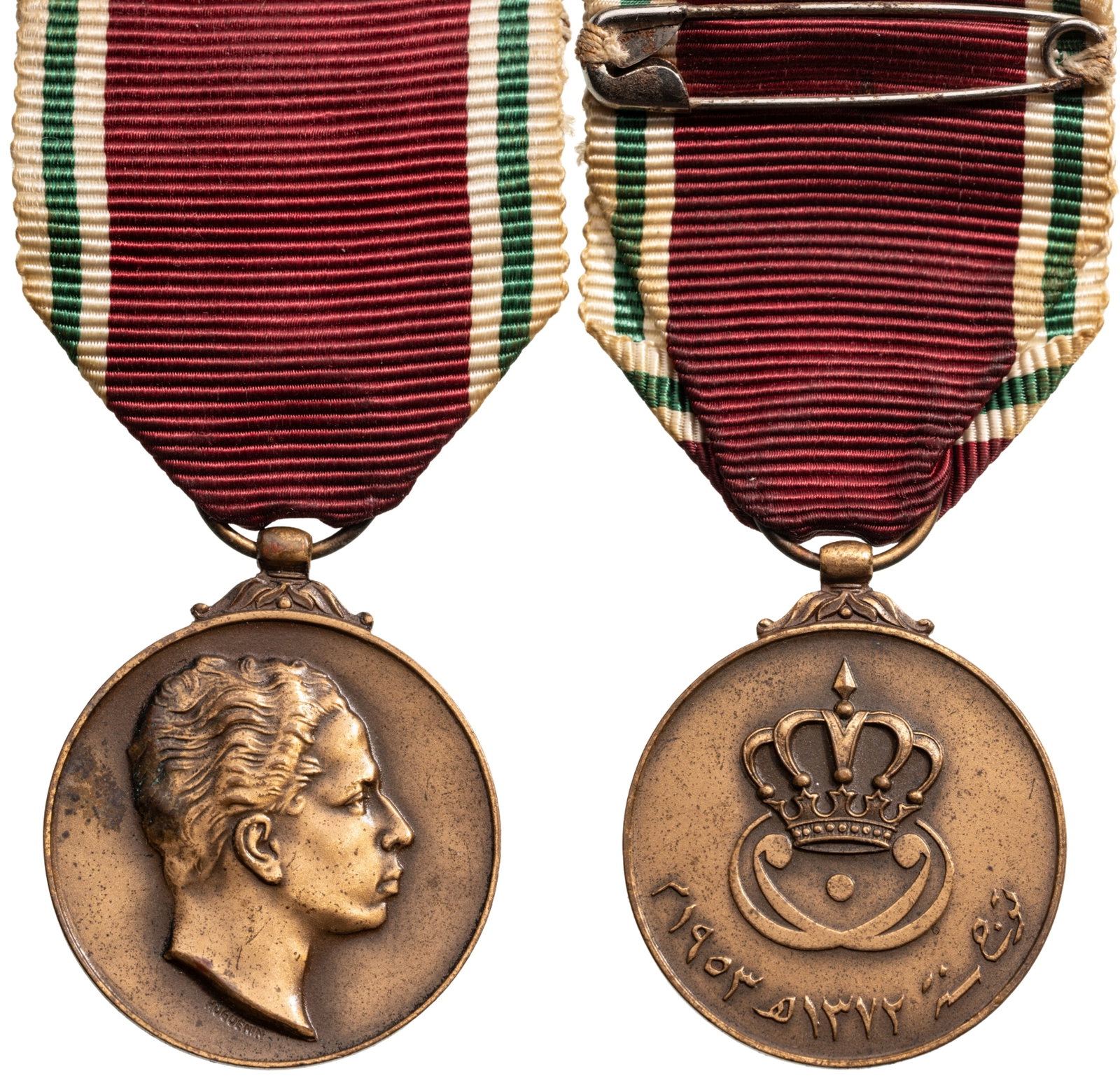 Coronation Medal of King Faisal, 1953: Bronze Class. Breast Badge, 38x32 mm, Bronze, original suspension ring and ribbon. Very attractive and scarce! I R!