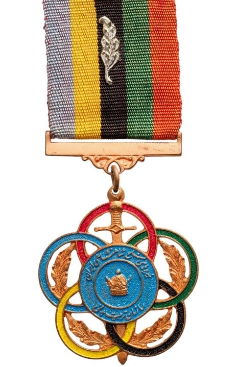 ORDER OF KHEDMAT VARZESHI (Gratitude for Service in Sports): Breast Badge, 55x49 mm, Bronze, multipart constrution, one-side enameled, original suspension bar, ring and ribbon. Very fine and scarce! I- R!