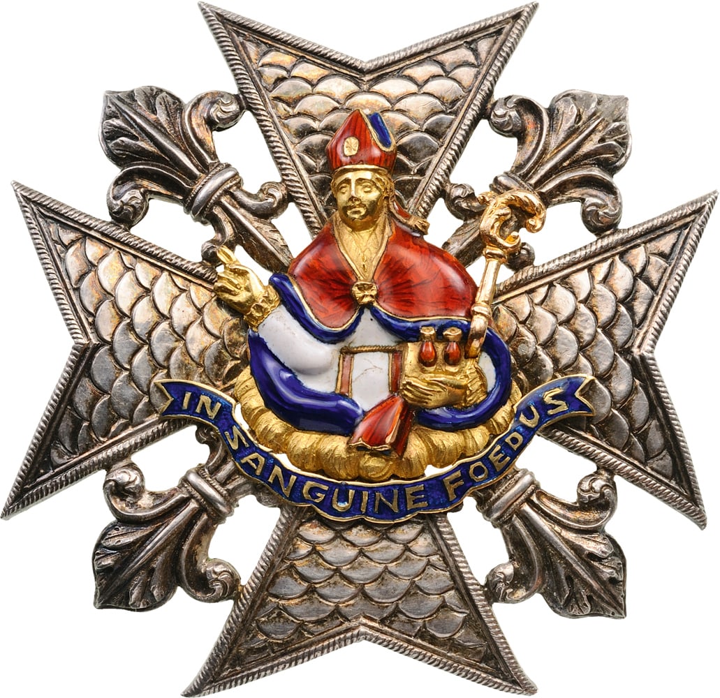 Order of St. Januarius: A Prince size breast star of the order in silver, 57x57,5 mm., chiselled to imitate a sequined embroidery, flanked by ornated fleurs-de-lys; chiselled gold centre with enameled details of the robe of 