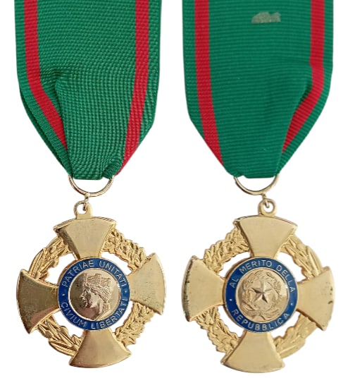 ORDER OF MERIT OF THE ITALIAN REPUBLIC: Knight's Cross, 2nd Model, instituted in 1861. Breast Badge, 45x41 mm., gilt Bronze, center enameled, original suspension ring and ribbon. Mint state! I
