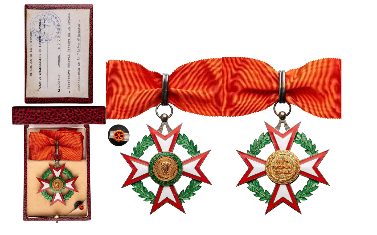 National Order of the Ivory Coast: Commander's Cross, 3rd Class, instituted in 1961. Neck Badge, 64x57 mm, partially gilt Silver, hallmarked, enameled, superimposed part gilt enameled, with original suspension ring, loop and ribbon, in