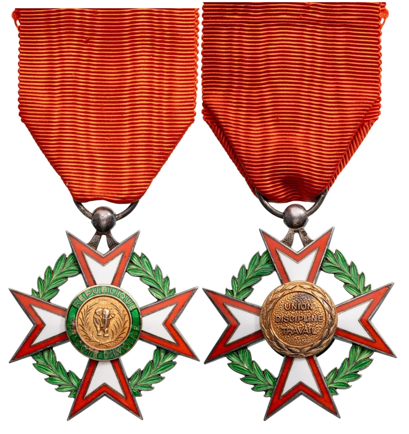 National Order of the Ivory Coast: Knight's Cross, 5th Class, instituted in 1961. Breast Badge, 44x39 mm, partially gilt Silver, hallmarked, enameled, superimposed part gilt enameled, with original suspension ring and ribbon. Attractiv