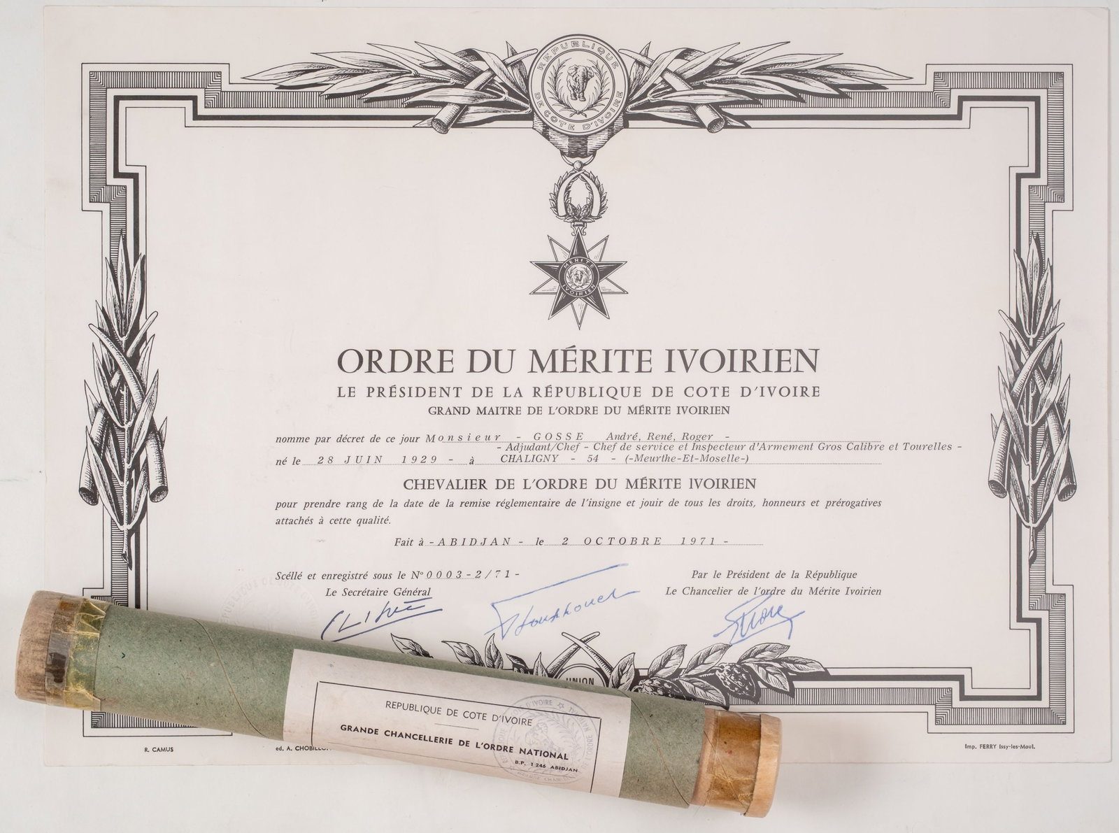 Order of Merit of the Ivory Coast: Knight's Cross, 5th Class, instituted in 1970. Neck Badge, 75x39 mm, Silver, enameled, superimposed part gilt enameled, with original suspension wreath, ring and ribbon, together with awarding documen