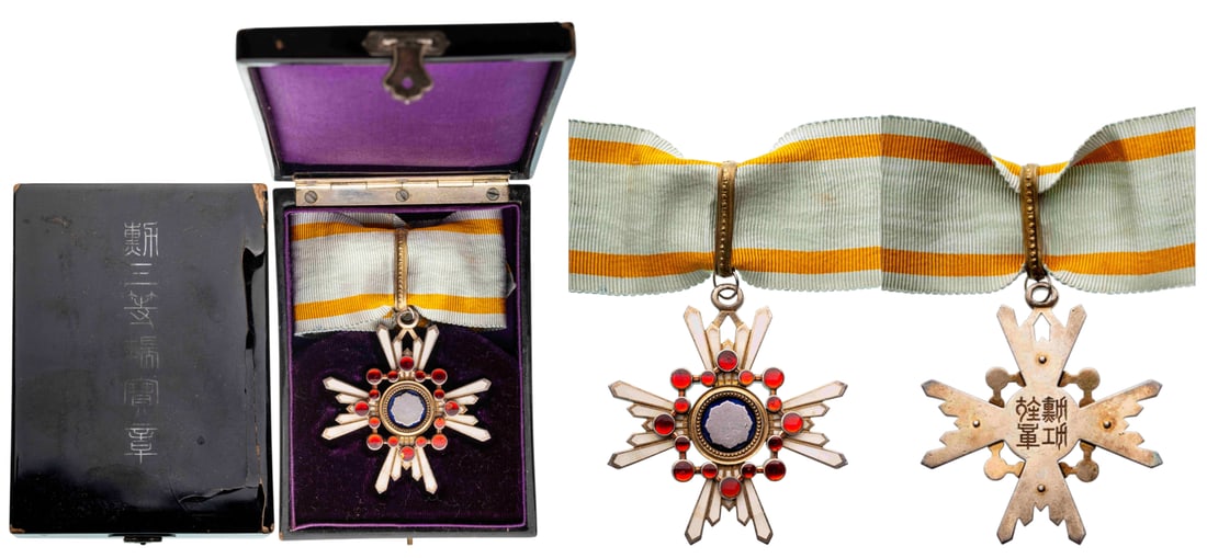 ORDER OF THE SACRED TREASURE (Kunnito zuihisho): Commander's Cross, 3rd Class, instituted in 1888. Neck Badge, 57x52 mm., partially gilt Silver, one side enameled, reverse with Japanese inscriptions, suspension rings, loop and ribbon, in laquered ca