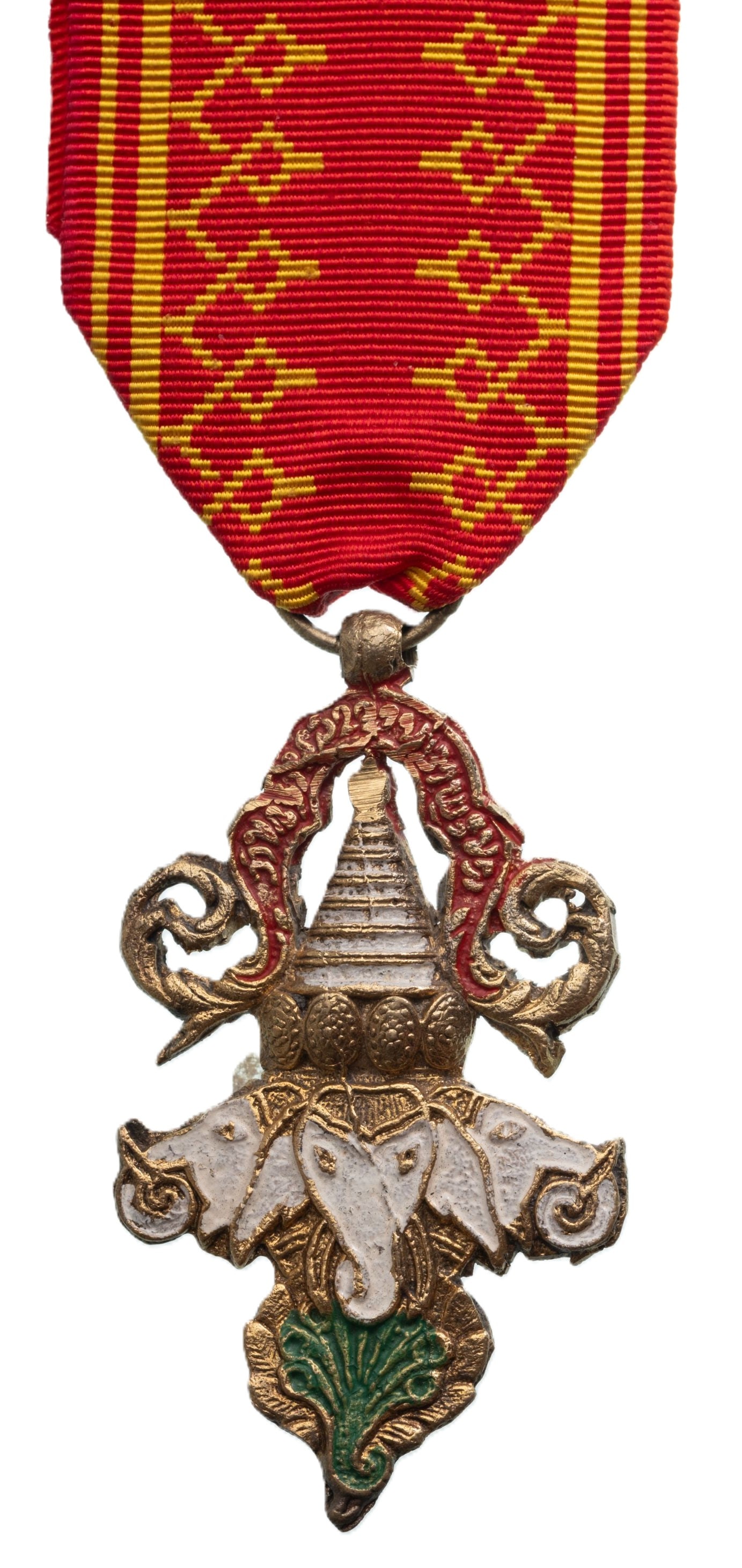 Order of the Million Elephants and the White Parasol: Knight's Cross, 6th Class, instituted in 1909. Breast Badge, 58x32 mm, gilt Bronze, one side enameled, original suspension ring and ribbon. Local manufacture in very fine condition! I