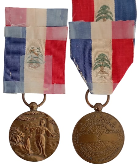 Order of Merit: Bronze Medal. Breast Badge, 36x31 mm, Bronze, original suspension ring and damaged ribbon. I-
